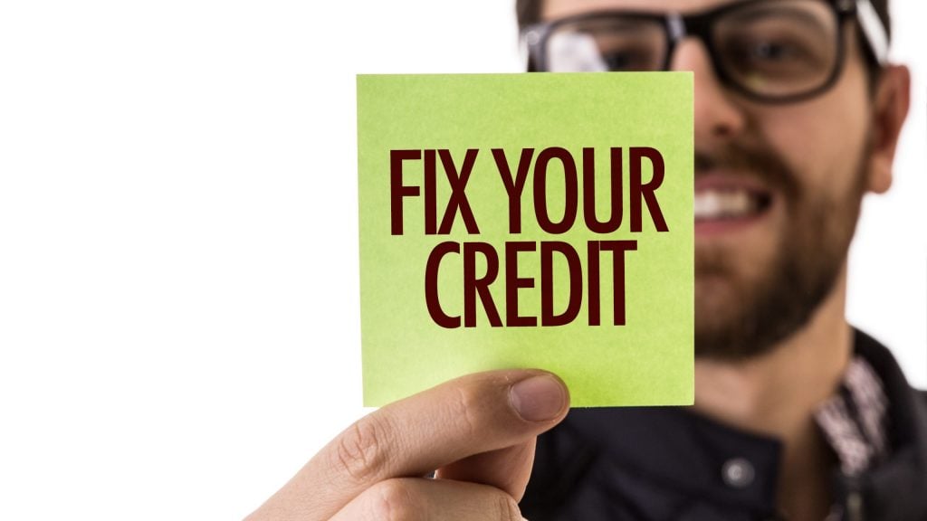 fix your credit score post it concept