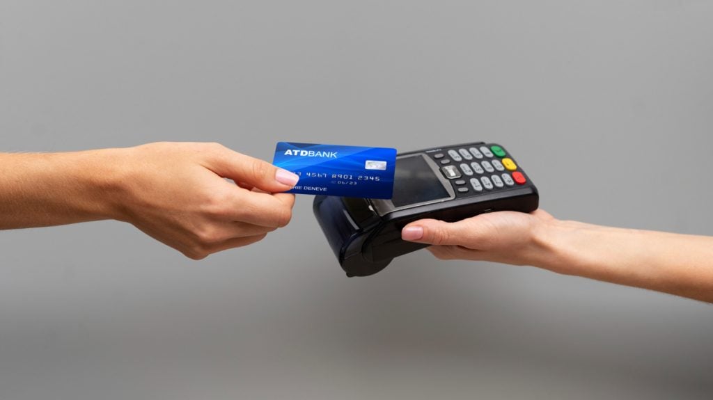 person paying with secured credit card
