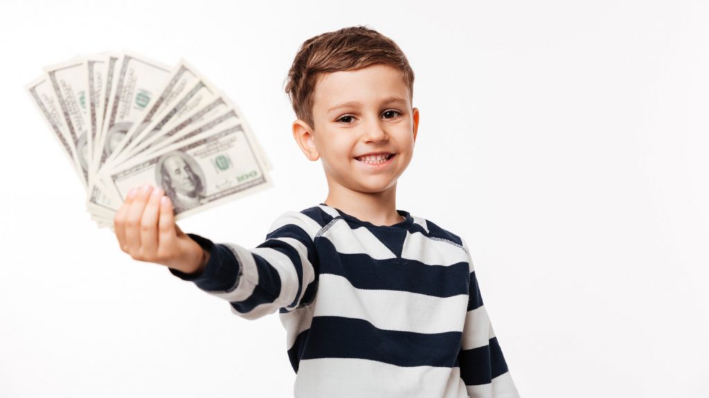 kid holding a lot of money