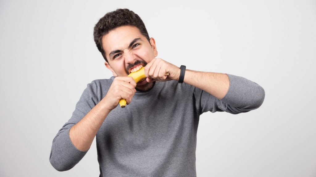 man eating banana to break world record