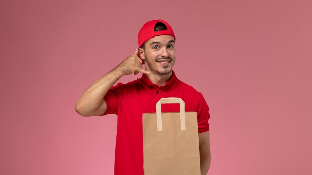 young man working on food delivery
