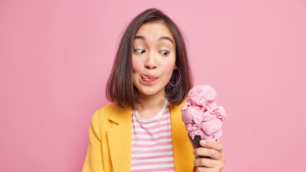 young woman eating ice cream