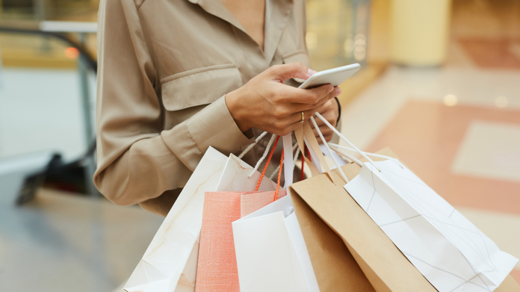 woman using Bank of America® Customized Cash Rewards shopping