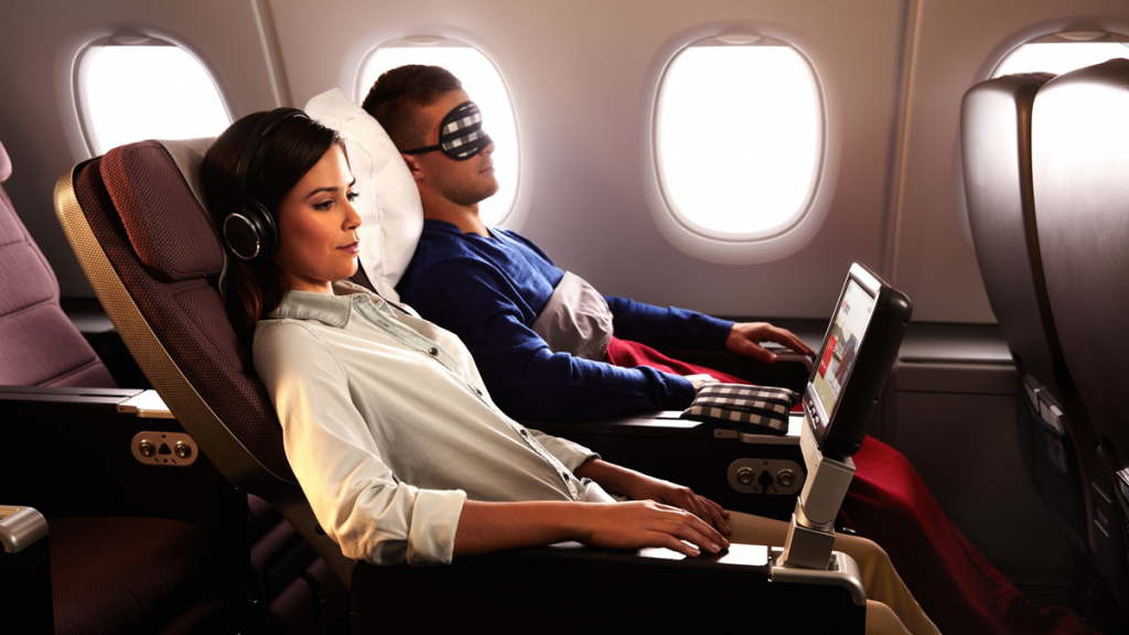 couple lounging on a plane